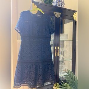 ANN TAYLOR black & navy lace dress with floral detail. Lined with back zipper.